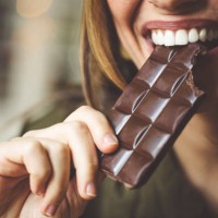 eating chocolate - food stock pictures, royalty-free photos & images