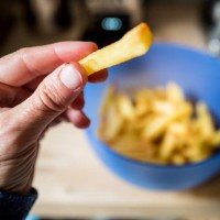 eating french fries - junk food stock pictures, royalty-free photos & images
