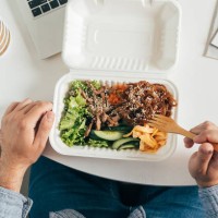 eating healthy lunch bowl in man's hands. delicious balanced food concept. delivery food, home office, dieting, detox. - junk food stock pictures, royalty-free photos & images