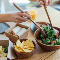 eating healthy takeaway meal at home - junk food stock pictures, royalty-free photos & images