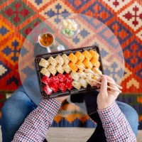 eating sushi at home, directly above personal perspective view - junk food stock pictures, royalty-free photos & images