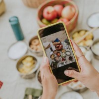 eco friendly family take a photo on homemade food in lunch box for picnic on holiday - stock photo - food stock pictures, royalty-free photos & images