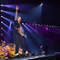 Ed Sheeran performs during a Concert for Ukraine at Resorts World Arena on March 29, 2022 in Birmingham, England. All proceeds from Concert for...