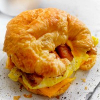 egg, sausage and cheese breakfast croissant - junk food stock pictures, royalty-free photos & images