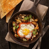 eggs fried in peppers with hash browns - junk food stock pictures, royalty-free photos & images