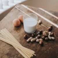 eggs, pasta, nuts and milk - food stock pictures, royalty-free photos & images