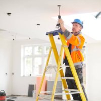 electrician installing downlights - home decoration stock pictures, royalty-free photos & images