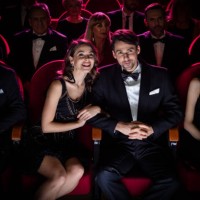 elegant couple watching opera performance - concert stock pictures, royalty-free photos & images