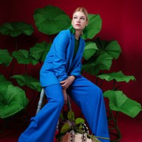 elegant woman wearing blue suit - fashion stock pictures, royalty-free photos & images