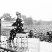 Elton John performing in Central Park, New York, America, Elton drew a huge crowd of over 400,000 to the free concert, With a set list of over 20...