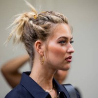 Emili Sindlev wears earrings outside Fendi during the Milan Fashion Week - Womenswear Spring/Summer 2024 on September 20, 2023 in Milan, Italy.