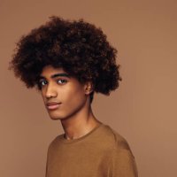 emotional african american man with african hairstyle - hairstyle stock pictures, royalty-free photos & images