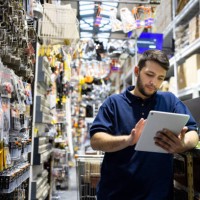 employee working at a hardware store taking inventory - home decoration stock pictures, royalty-free photos & images