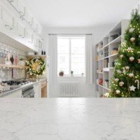 empty white marble surface and blurred kitchen background with christmas tree - food stock pictures, royalty-free photos & images