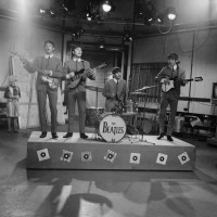 English rock and pop group The Beatles, from left Paul McCartney, John Lennon , Ringo Starr and George Harrison , on stage during rehearsals for the...
