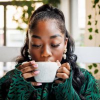 enjoying a warm beverage - coffee stock pictures, royalty-free photos & images