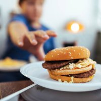 enjoying my favorite cheeseburger right now - food stock pictures, royalty-free photos & images