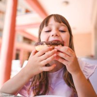 enjoying tasty food. - junk food stock pictures, royalty-free photos & images