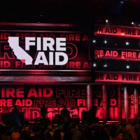 Eshele Williams and family speak onstage during the FIREAID Benefit Concert for California Fire Relief at The Kia Forum on January 30, 2025 in...