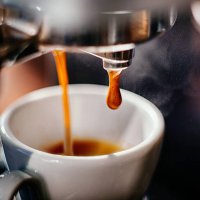 espresso shot pouring out. - coffee stock pictures, royalty-free photos & images
