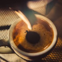 espresso shot pouring out of steamy machine. - coffee stock pictures, royalty-free photos & images