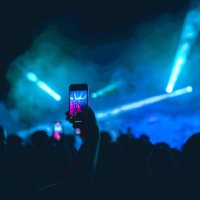 exciting lightning during dj party recorded by people on smartphones - concert stock pictures, royalty-free photos & images