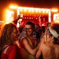 exhilarated people at concert - concert stock pictures, royalty-free photos & images