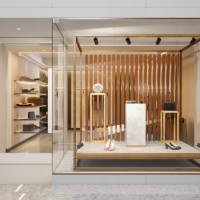 extérieur du magasin de vêtements avec des chaussures et d’autres accessoires affichant dans la vitrine - fashion photos et images de collection