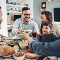extended family eating together - food stock pictures, royalty-free photos & images