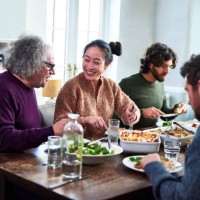 extended family having meal together - food stock pictures, royalty-free photos & images