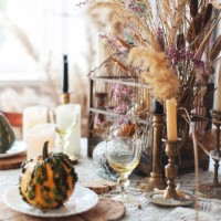 fall decor halloween style table setting with candles, pampas grass, reeds, pumpkins. rustic style - home decoration stock pictures, royalty-free photos & images