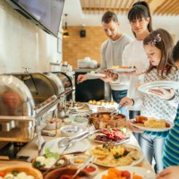 family at breakfast in hotel restaurant - food stock pictures, royalty-free photos & images
