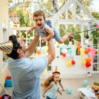 family celebrates a birthday together - garden decoration stock pictures, royalty-free photos & images