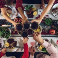 family dining at christmas table - food stock pictures, royalty-free photos & images