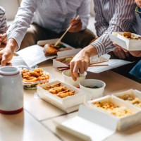 family eating takeout food - junk food stock pictures, royalty-free photos & images
