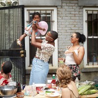 family enjoying backyard barbecue - garden decoration stock pictures, royalty-free photos & images