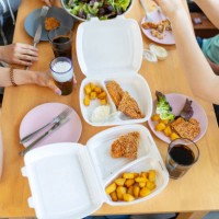 family having delivered meal during covid-19 outbreak - junk food stock pictures, royalty-free photos & images