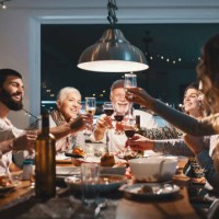 family having dinner on christmas eve. - food stock pictures, royalty-free photos & images