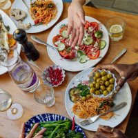 family having home cooked meal together - food stock pictures, royalty-free photos & images