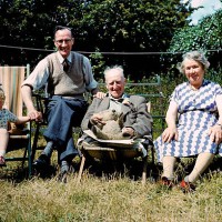 family in garden - garden decoration photos et images de collection