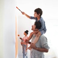 family painting wall during home renovation - home decoration stock pictures, royalty-free photos & images