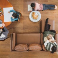 family relaxed with dogs in the living room, aerial view - home decoration stock pictures, royalty-free photos & images