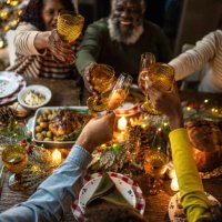 family toasting on christmas dinner at home - food stock pictures, royalty-free photos & images