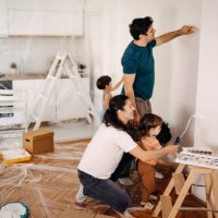 family whitewashes their apartment - home decoration stock pictures, royalty-free photos & images