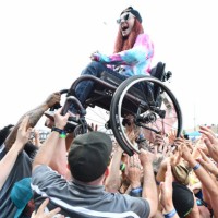 Fan gets carried over the crowd at the Punk in Drublic presents final NOFX tour at National Western Complex Stockyards on July 21, 2024 in Denver,...
