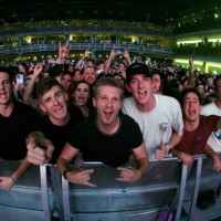 Fans attend a concert by recording artist Machine Gun Kelly during a stop of his Tickets to My Downfall tour at The Theater at Virgin Hotels Las...