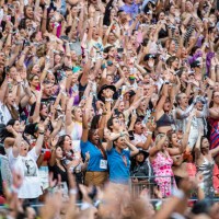 Fans cheer as Taylor Swift performs during night one of The Eras Tour in Empower Field at Mile High in Denver, Colo., on Friday, July 14, 2023....