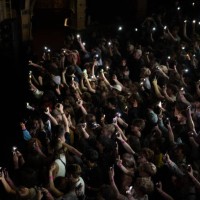 Fans light up the stage with their phone torches whlst Mac Demarco performs at Hackney Empire on July 30, 2023 in London, England.