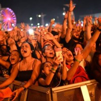 Fans of the Brazilian DJ Alok enjoy his concert on the Main stage of the Rock in Rio music festival at the Olympic Park in Rio de Janeiro, Brazil, on...
