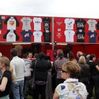 Fans queue to buy Kings of Leon merchandise before the concert at Murrayfield Stadium in Edinburgh.Stadium